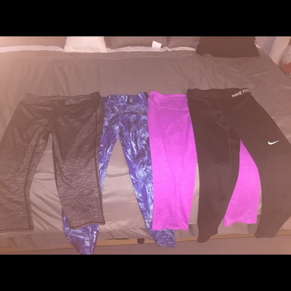 Group of Athleta and Nike pro leggings